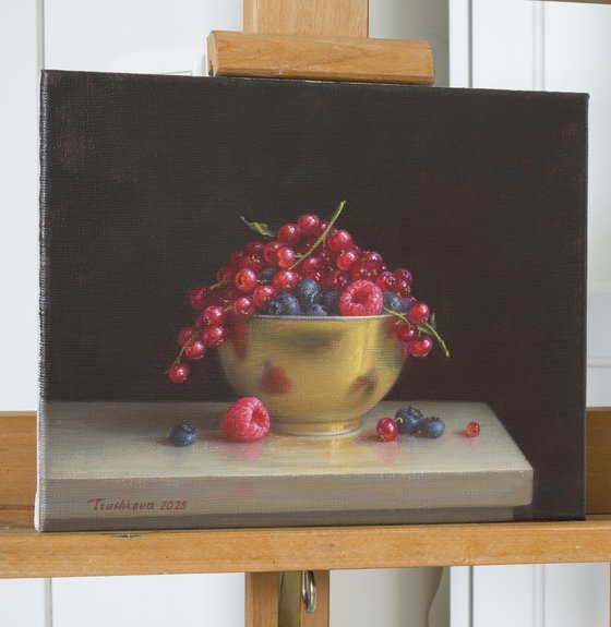 Berries in a golden bowl