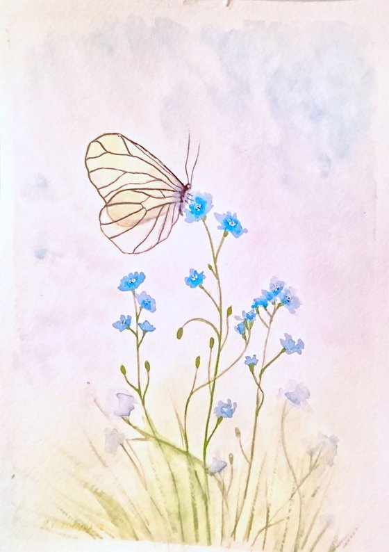 Butterfly and blue flowers