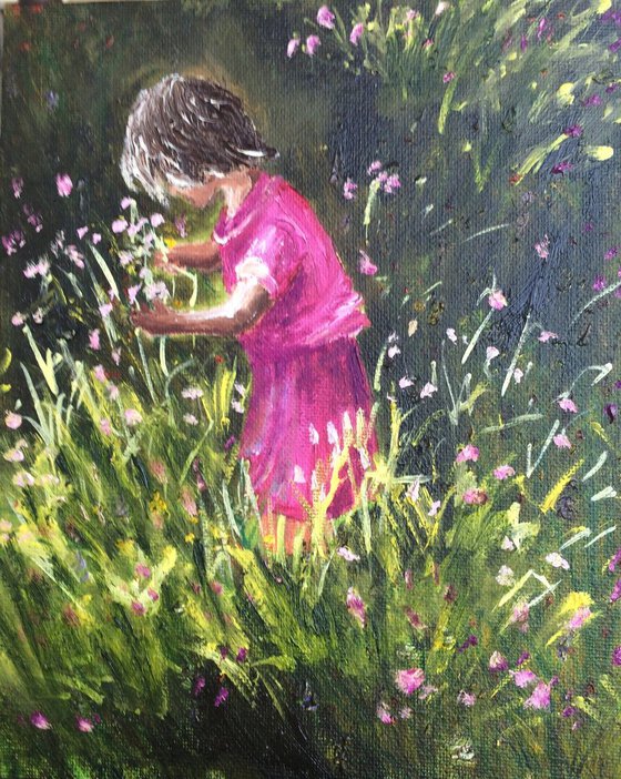 Girl picking flowers