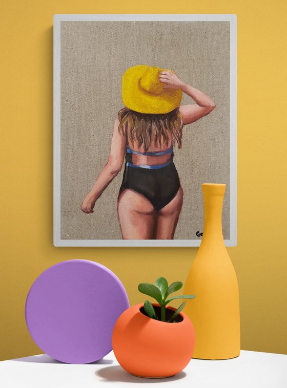 Girl in the yellow sun hat