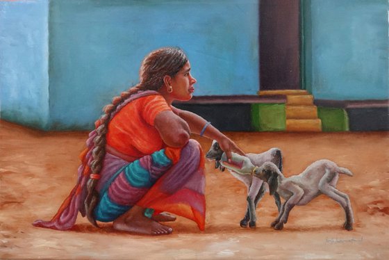 Woman petting Goats