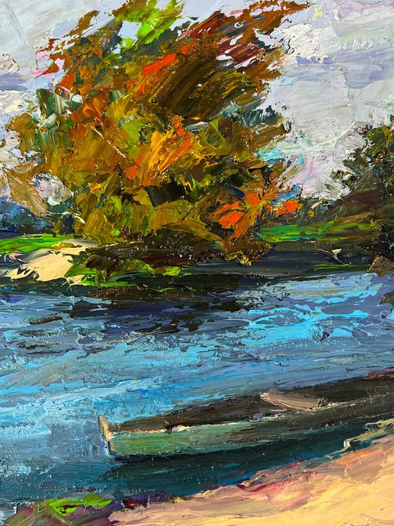 A Boat on the River Bank