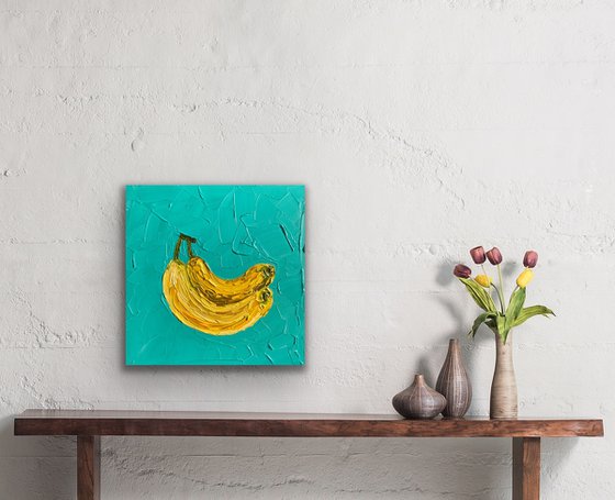 Bananas on emerald green