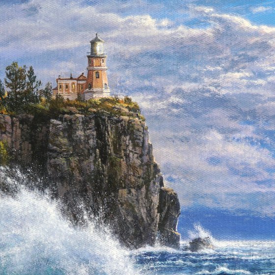 Lighthouse at the edge of the surf