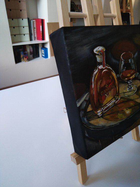 A man's still life with cognac