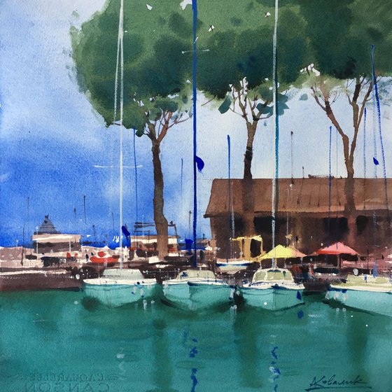 Yachts at the pier.  Lake Garda, Italy