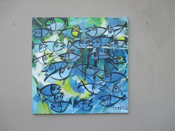 blue fishes jumping