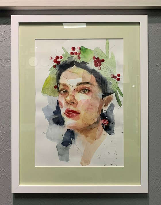girl in a wreath with berries
