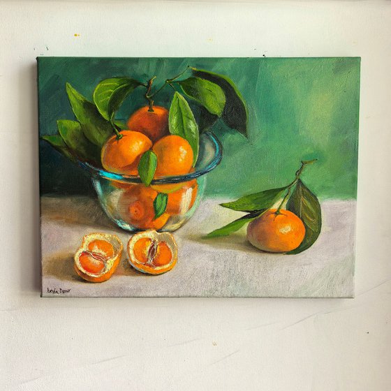 Tangerines in glass bowl