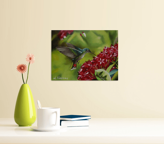 Hummingbird and Red Blossoms