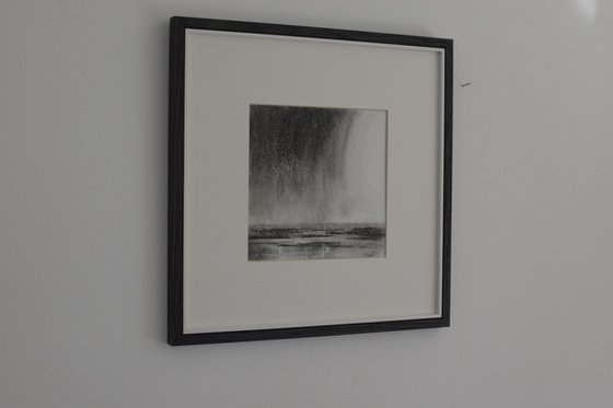 Charcol rain on the beach