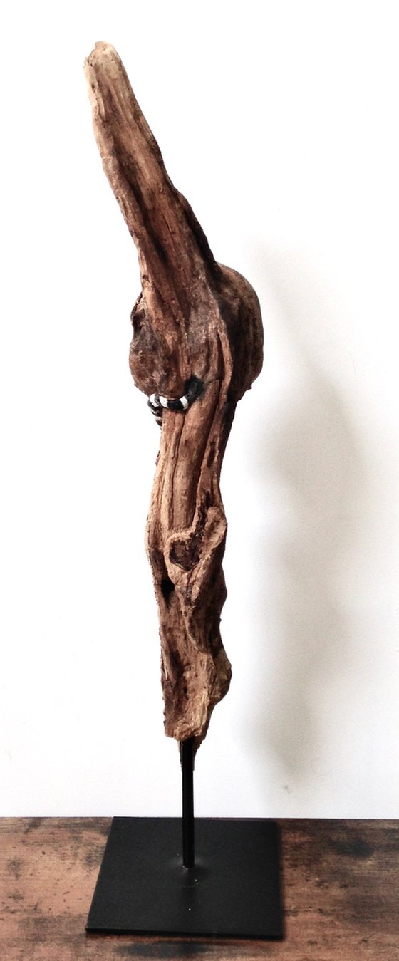 The Schlimp, ethnic sculpture in natural wood