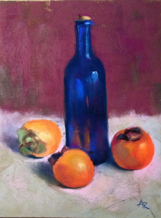 Persimmons and blue bottle