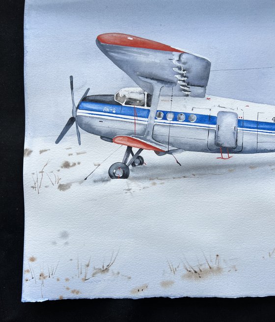 The plane is parked. Original watercolor artwork.