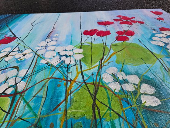 Red field poppies, blue red white abstraction