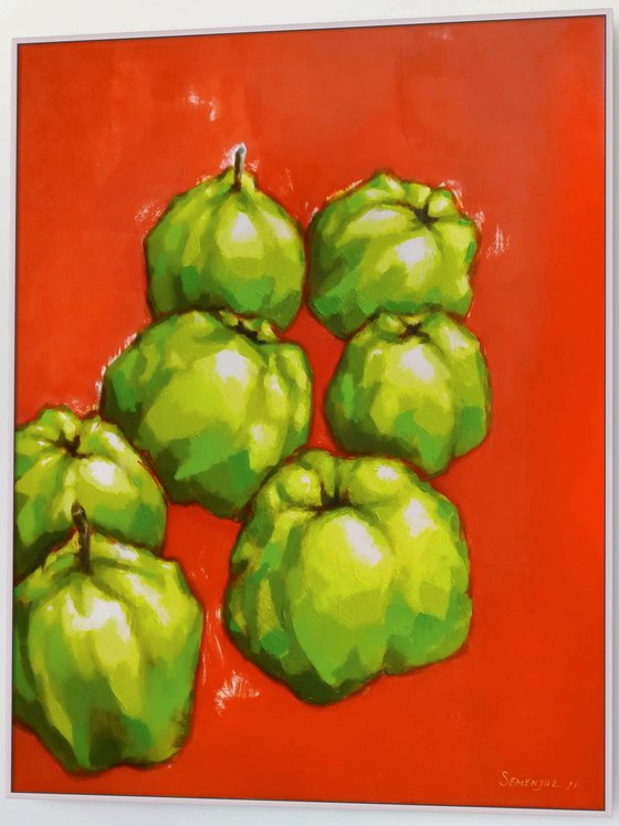 Green fruits on red background