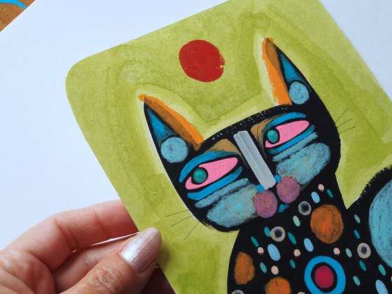 Cat - green sky red sun
