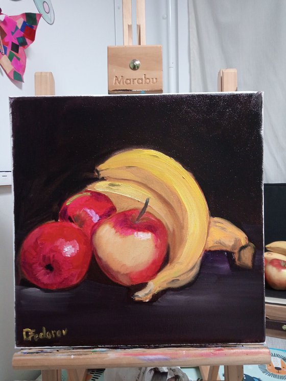 Still life with bananas and red apples