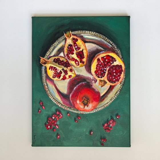 Pomegranates on metal tray