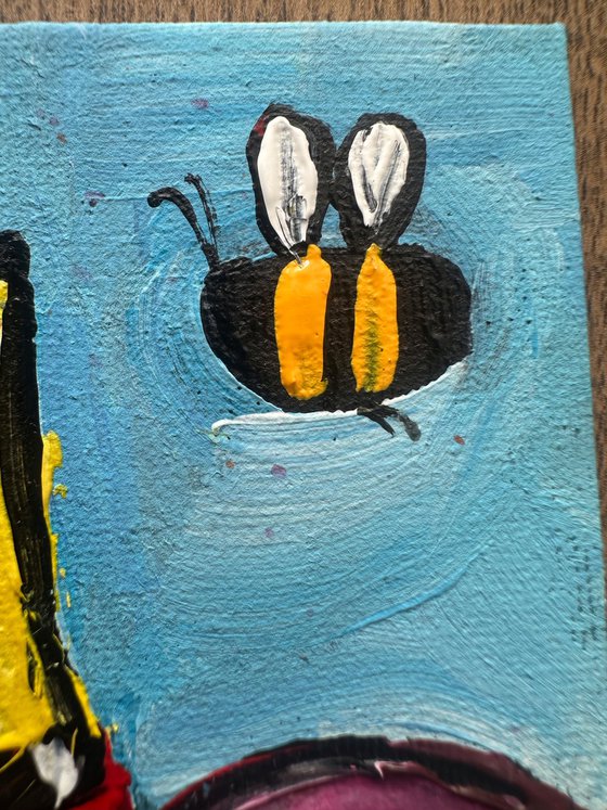 Cartoon flowers and bee