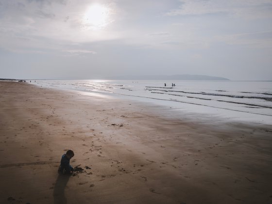 THE CHILD ON THE BEACH