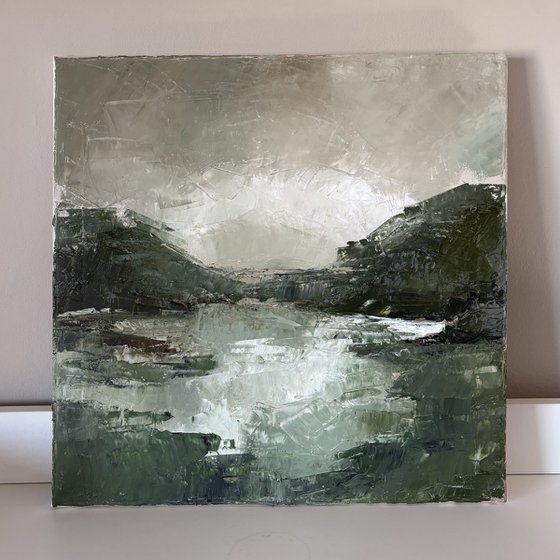 Dark textured green lagoon river mountains