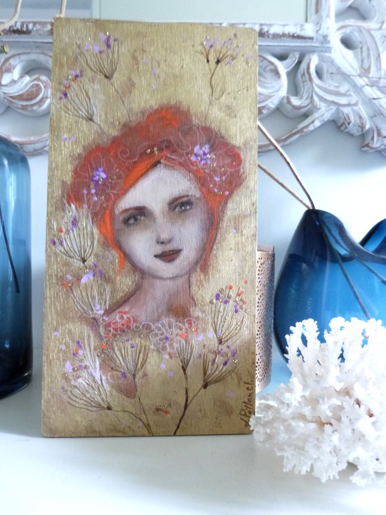 Sentimental 30 x 15 cm. Romantic redheaded woman on wood.