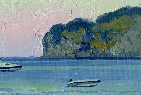 Sunset. Boats on the sea