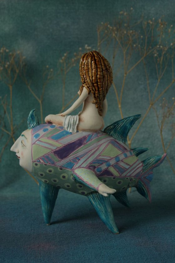 Girl riding the moon fish. Sculpture by Elya Yalonetski, 2018