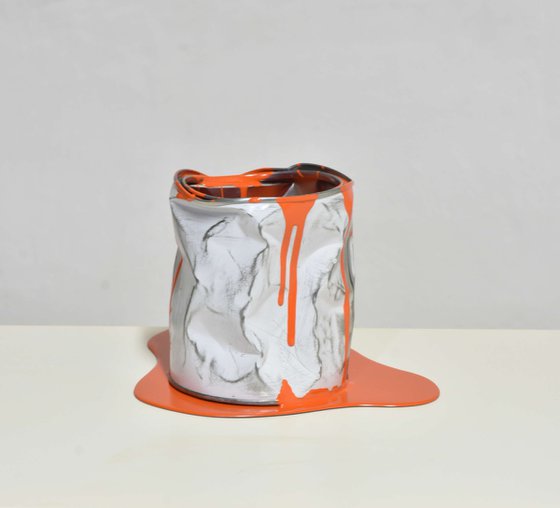 The old orange paint can