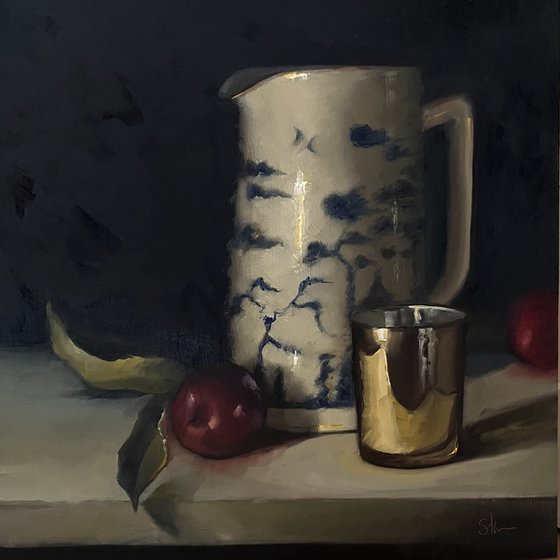 Plums and china jug.