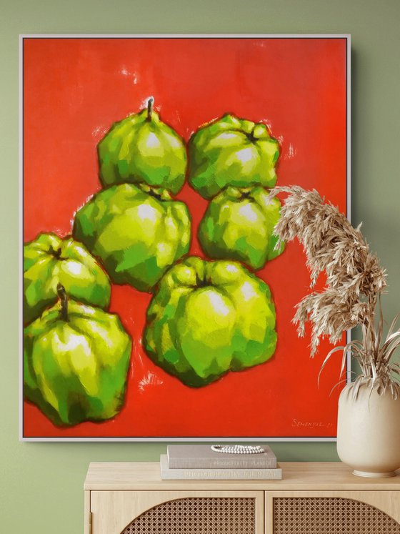 Green fruits on red background