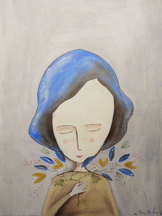 The girl with a plant and flowers on her hand