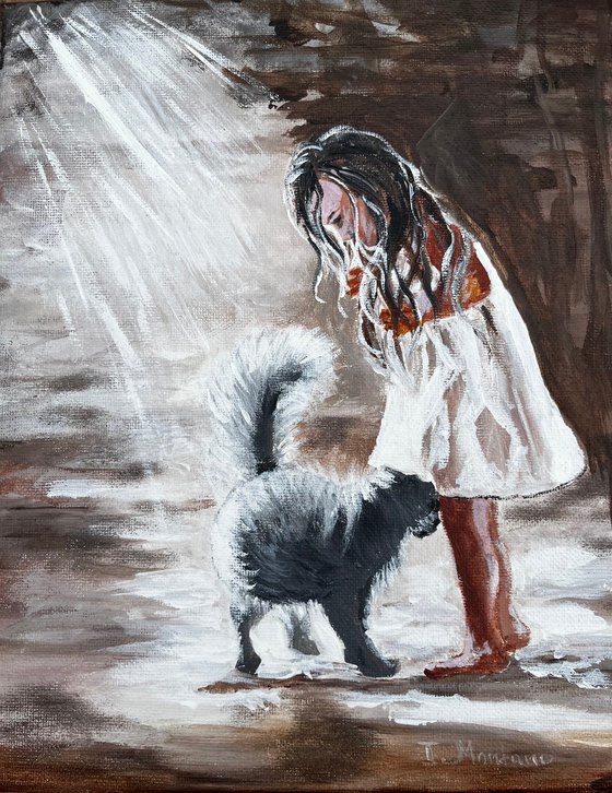 Little girl with a black cat.