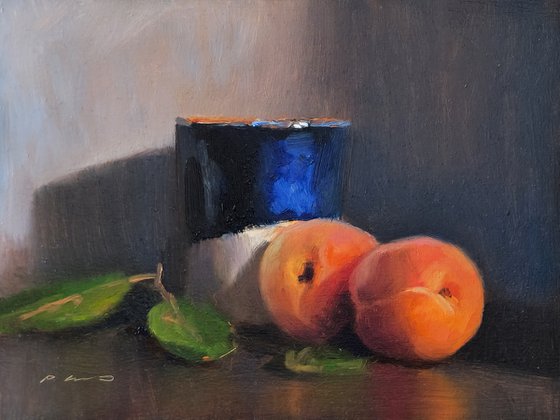 Apricots and a Blue Cup