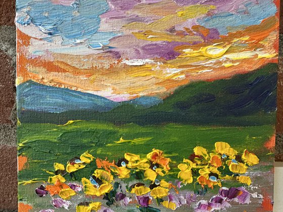 Orange sunset with flowers