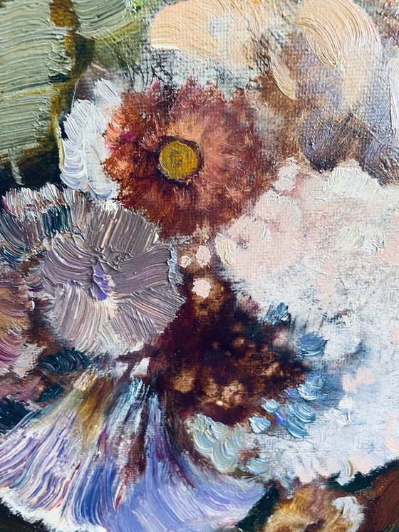 A lush bouquet in a pink vase