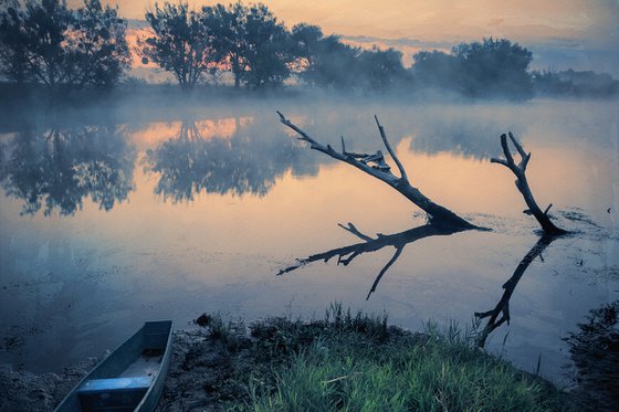 Misty morning. Over the quiet river.