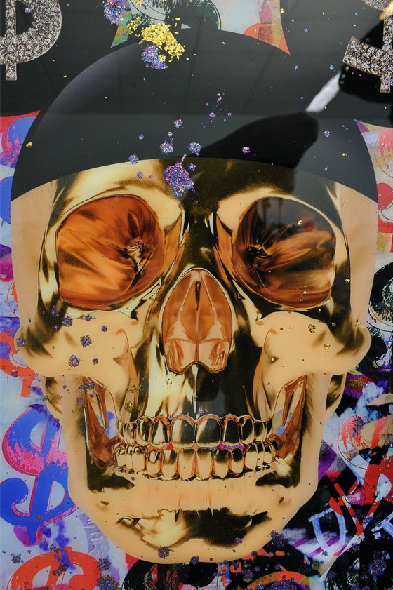 Golden dollar skull