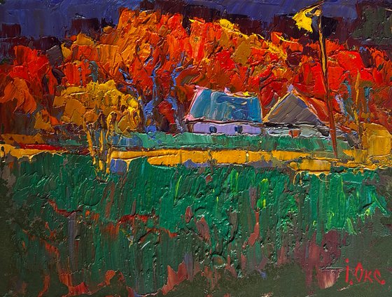 Crimson autumn in the village