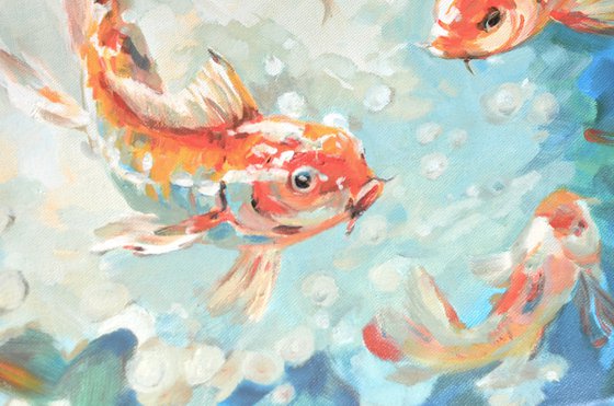 Bright red fish on blue