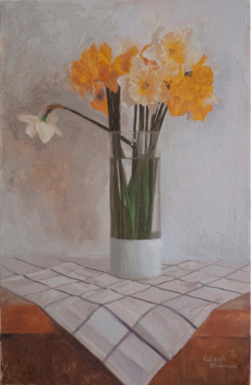 Yellow daffodils in a glass vase by Radosveta Zhelyazkova