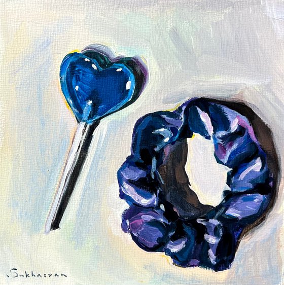 Still Life with Blue Lollypop and Hair Tie
