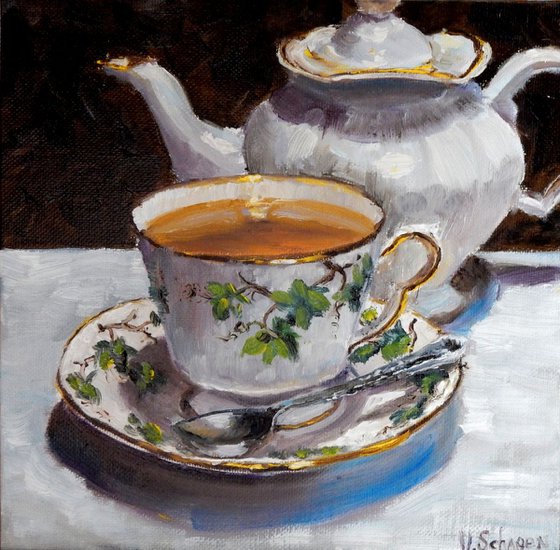 Tea cup and pot. still life