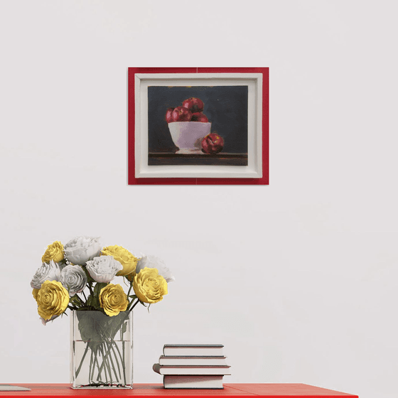 Apples in white bowl