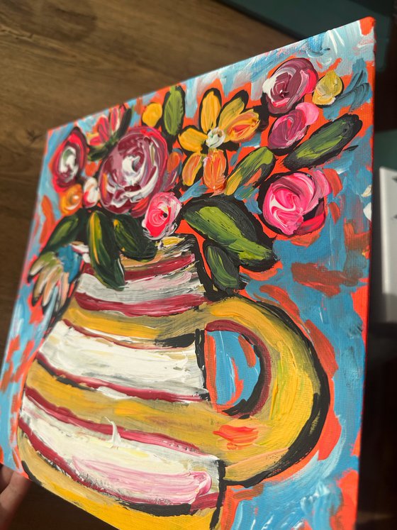 Pot and bright flowers