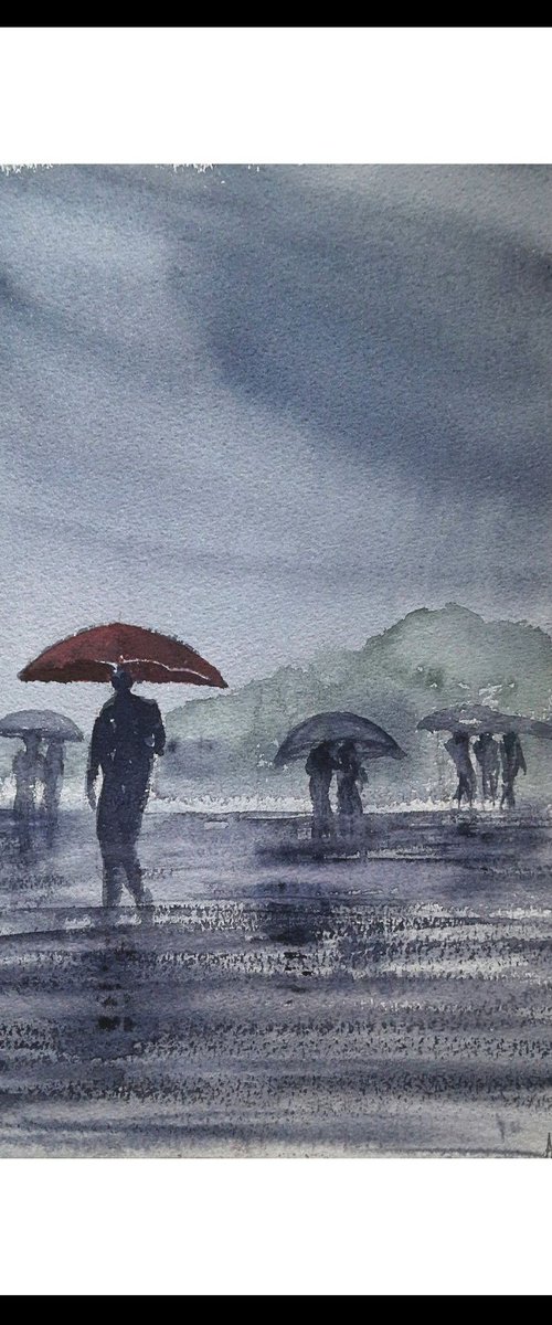 The Red Umbrella on a rainy day by Asha Shenoy