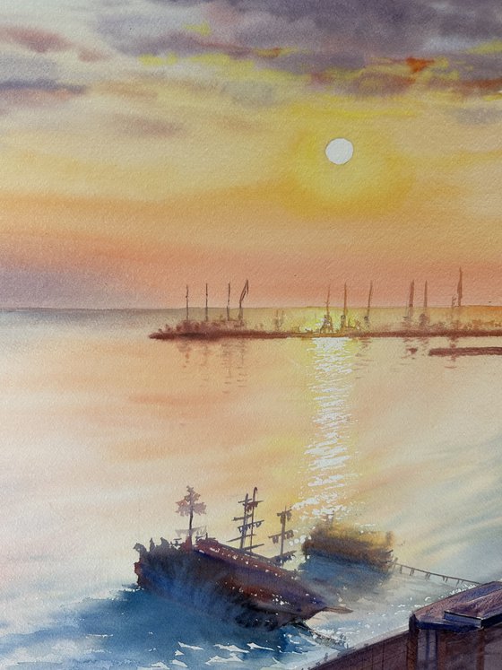 Serene Sunset over a Seaside Town