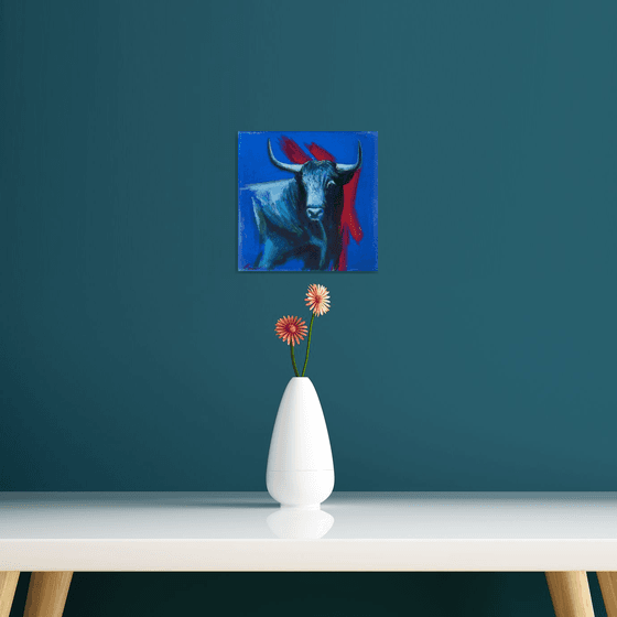 Bull's head on a blue background