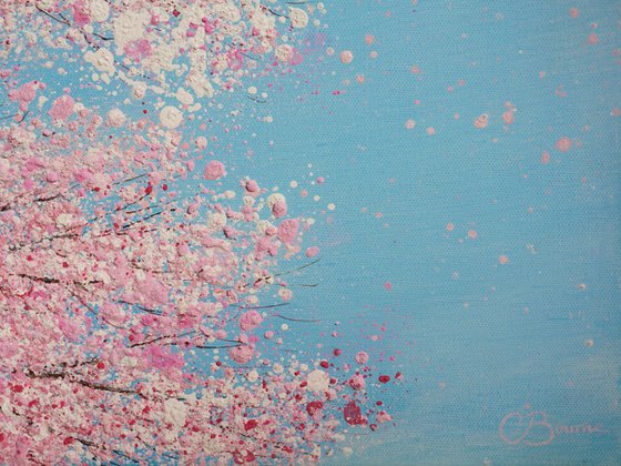 CHERRY BLOSSOM DANCES IN THE BLUE SKY